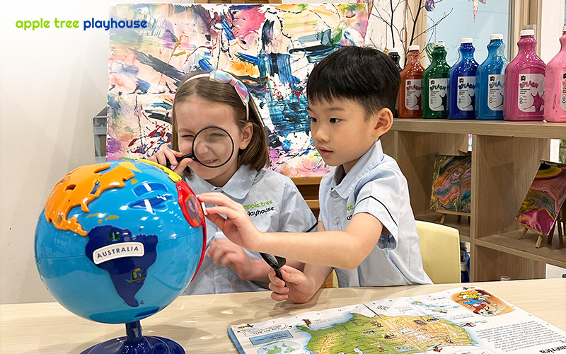 Focused child reading for early literacy development.